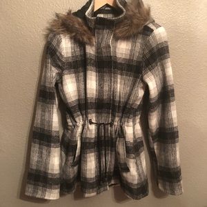 Black/white/grey plaid jacket with fur hoodie.